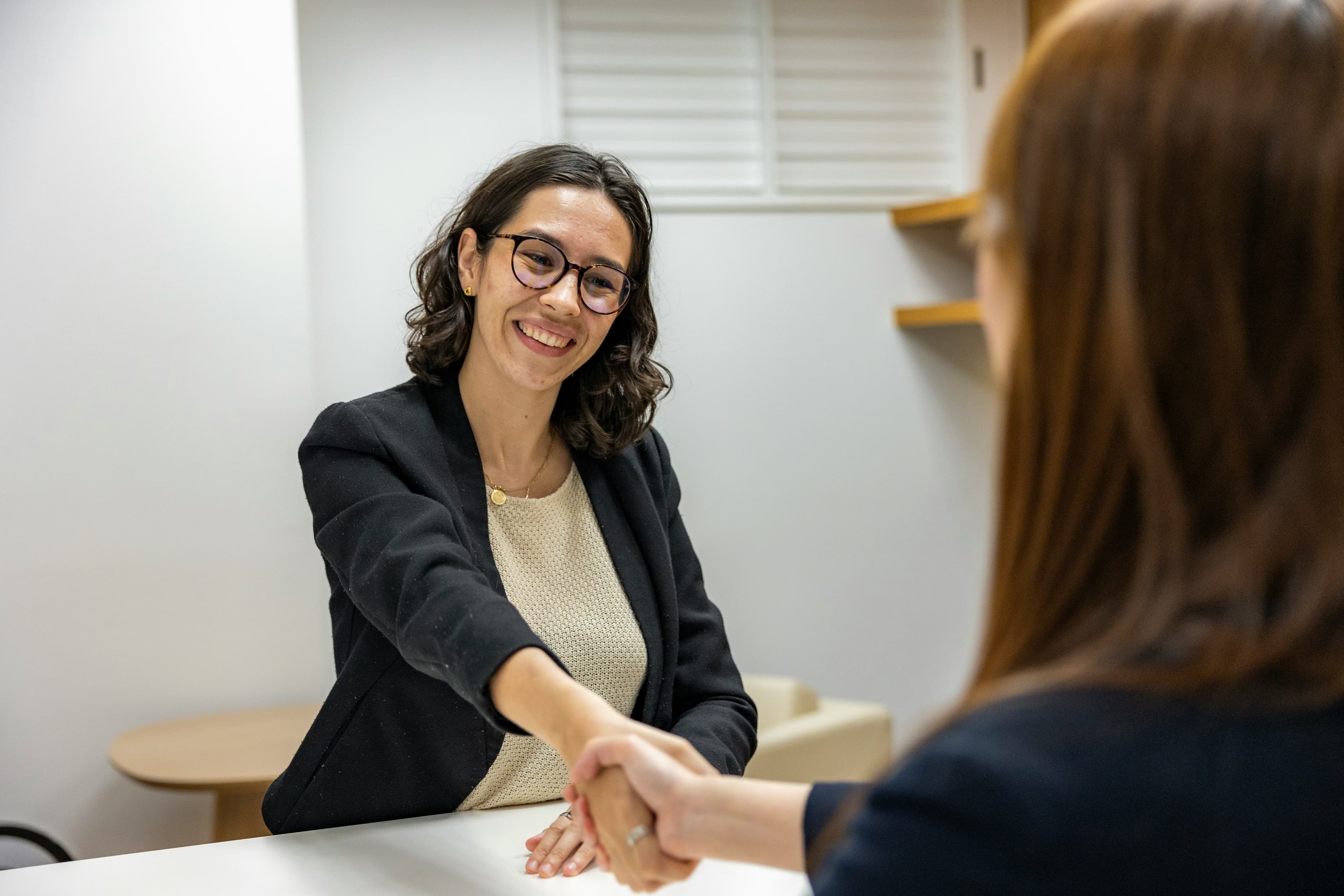 Professional shaking hands after a successful interview